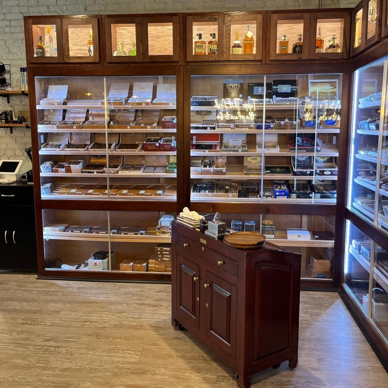 Cigar cabinet with cigars and humidifiers